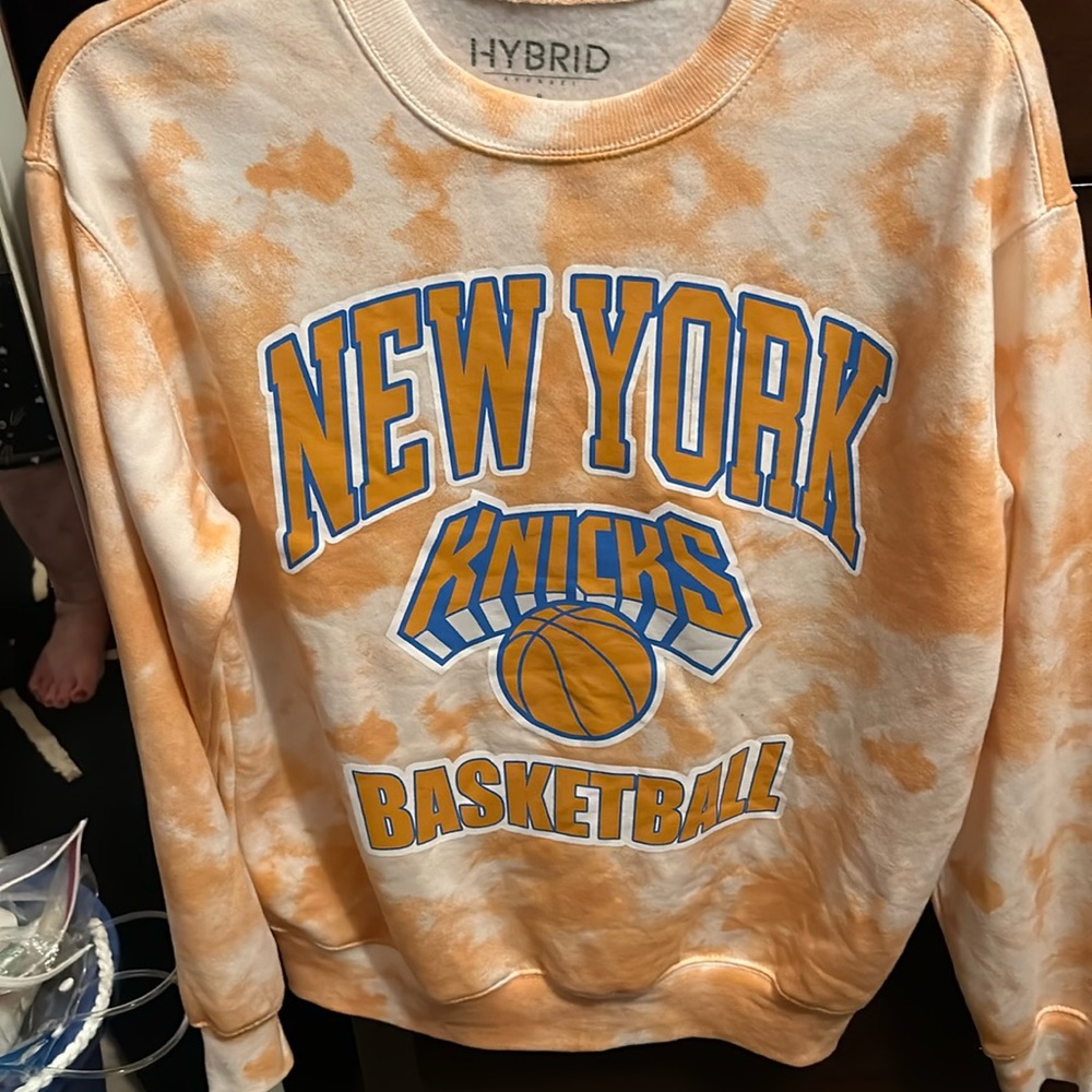 New York Knicks basketball sweatshirt with a tie-dye look.
